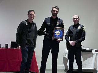 Officer Frank Bobo with the Officer of the Year Award